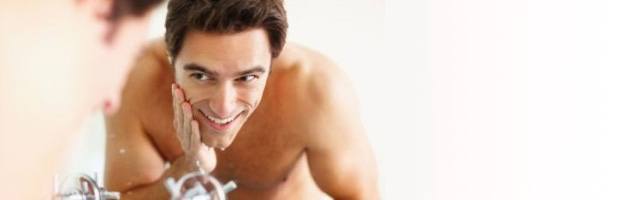 man-washing-face
